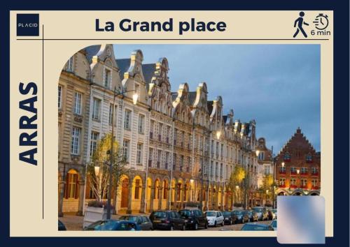 a large building with cars parked in front of it at Le ScottmanHouse - Appartement privé - Centre ville - Gare - Wi-Fi in Arras