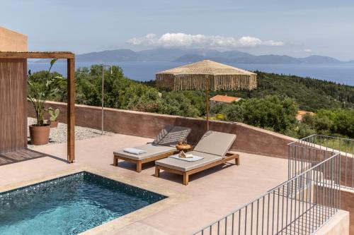 a villa with a swimming pool and a patio at Terracotta Fiscardo Villas in Fiskardho