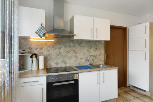 Η κουζίνα ή μικρή κουζίνα στο Ferienwohnung Rosita