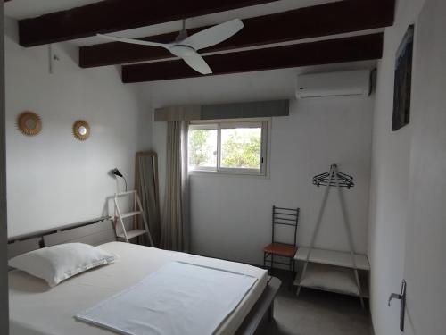 En eller flere senge i et værelse på Comme chez vous
