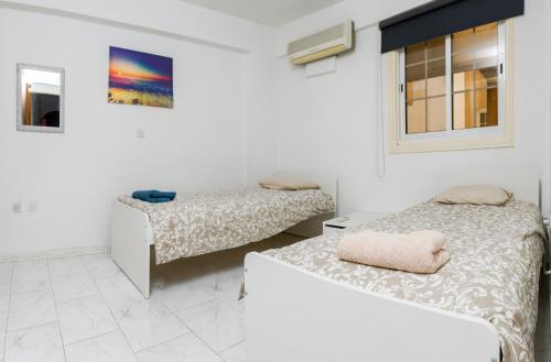 Ένα ή περισσότερα κρεβάτια σε δωμάτιο στο Martin 2 bed Apartment