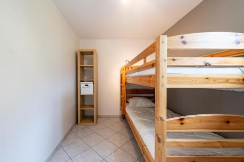 Ένα ή περισσότερα κρεβάτια σε δωμάτιο στο Appartement T2