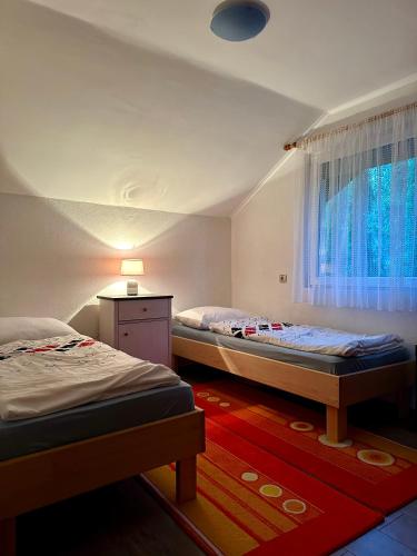 Postel nebo postele na pokoji v ubytování Vikendica Cokori
