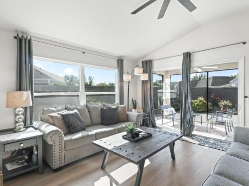 a living room with a couch and a table at 16837 Z2b Village of Woodbury by REMAX Premier in The Villages