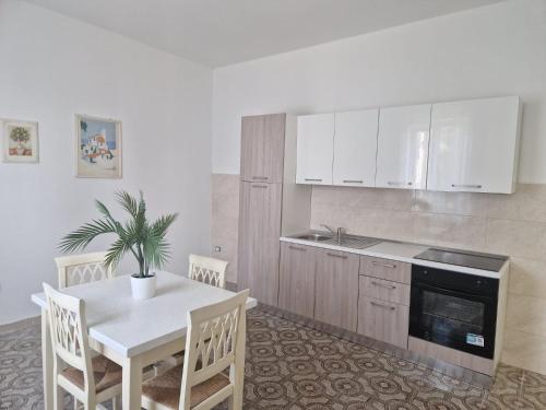 Η κουζίνα ή μικρή κουζίνα στο Casa Vacanza L'Orchidea
