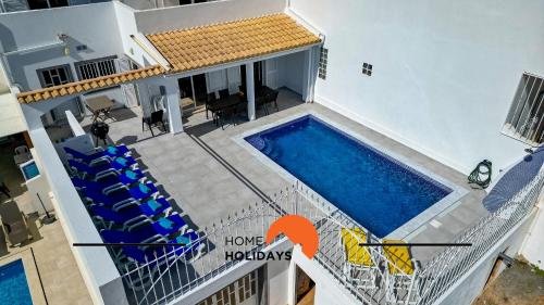 a view of a house with a swimming pool at #248 Villa Loureira 54 by Home Holidays in Albufeira