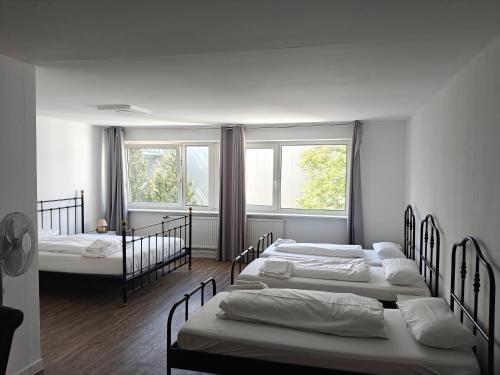 Ένα ή περισσότερα κρεβάτια σε δωμάτιο στο Hotel Rahlau