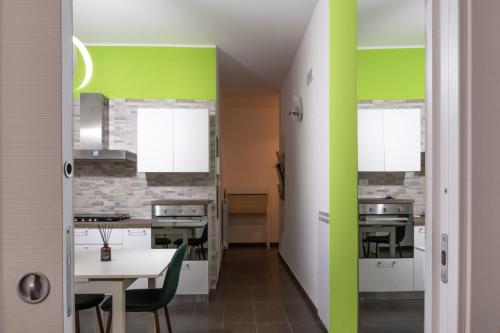 Kuchyň nebo kuchyňský kout v ubytování Via Vai Guest House