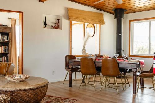 a dining room with a table and chairs at Twentynine Palms Desert Oasis with Pool and Hot Tub! in Twentynine Palms
