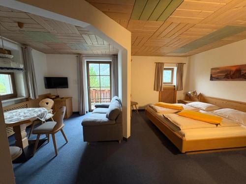 Postel nebo postele na pokoji v ubytování Residence Nordik