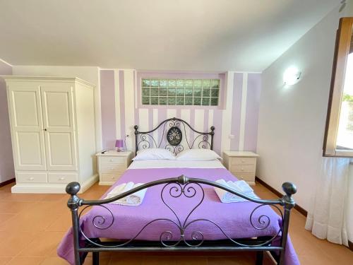 Cama o camas de una habitación en Casale Rotoloni