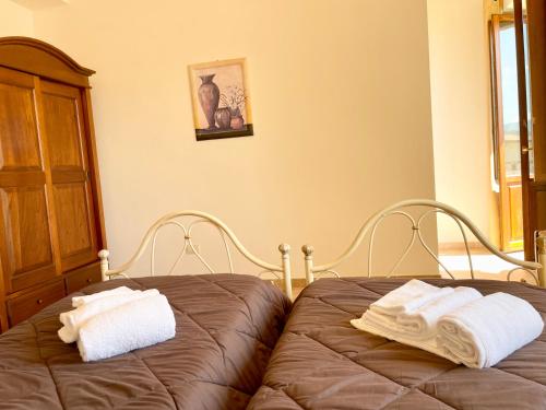 Cama o camas de una habitación en Casale Rotoloni