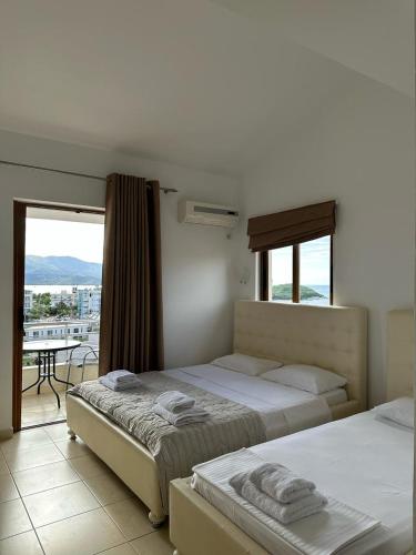 Postel nebo postele na pokoji v ubytování Hotel Marku