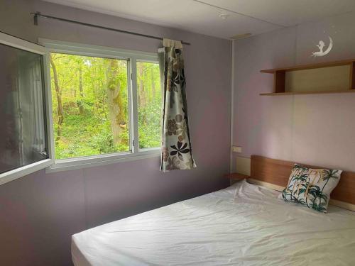 Postel nebo postele na pokoji v ubytování Mobil Home près de Paris