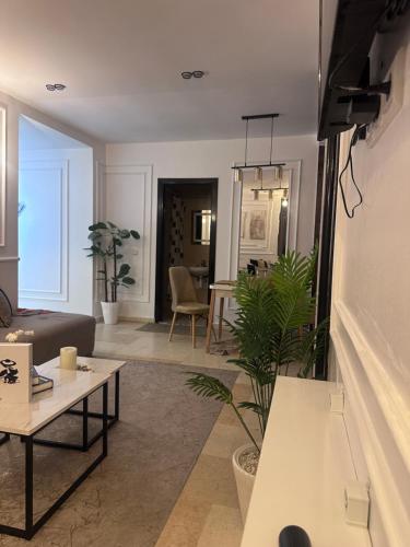 Ruang duduk di Appartement calme et lux