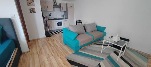 Kuchyň nebo kuchyňský kout v ubytování Apartment L&M