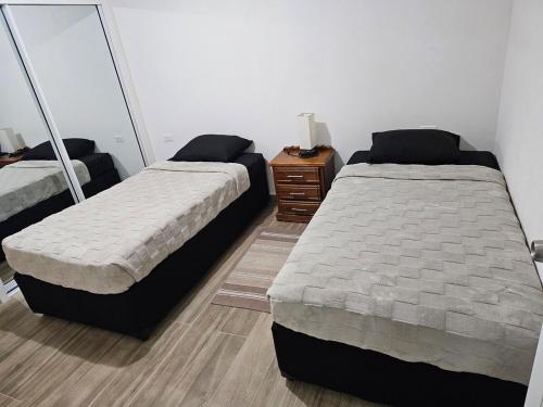 Postel nebo postele na pokoji v ubytování Sunset Cove