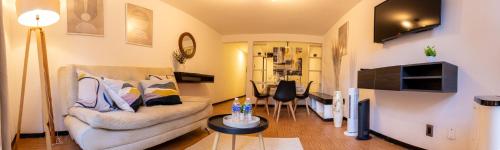 a living room with a couch and a table at Best location in Mexico City Cozy Master Suite in Mexico City