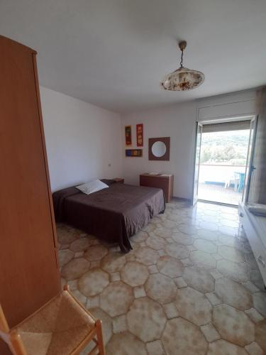 Ένα ή περισσότερα κρεβάτια σε δωμάτιο στο Villa Maria