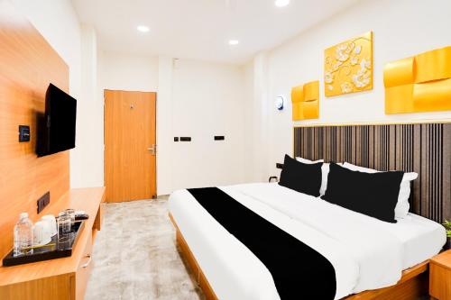 Postel nebo postele na pokoji v ubytování Super Hotel O Indriya