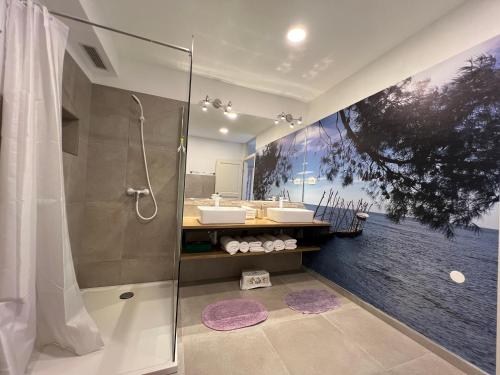 a bathroom with a shower and a sink at Villa Rafaela Umag in Umag