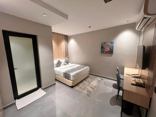 Katil atau katil-katil dalam bilik di السعادة سويت - الملز الرياض Saada Suites Serviced Apartments