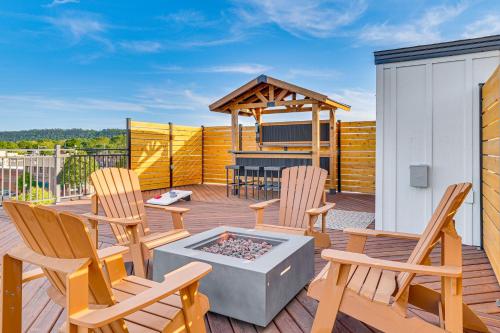 a deck with chairs and a fire pit and a gazebo at 1 Block to Lake City Marina Condo with Rooftop Deck in Lake City