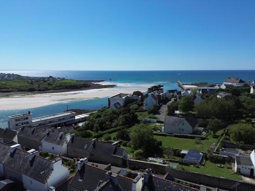 an aerial view of a town and the beach at Escape, splendid ocean view in Audierne