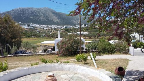a view of a town with a church and a mountain at Themonia in Apollonia