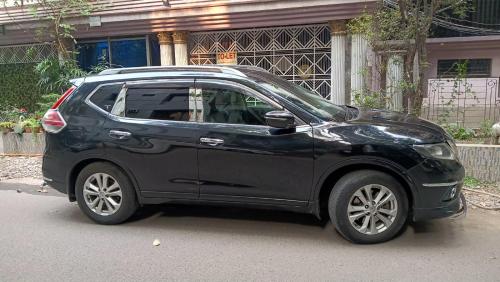 a black smart car parked on a street at Babylon Hotel & Serviced Apartment in Dhaka