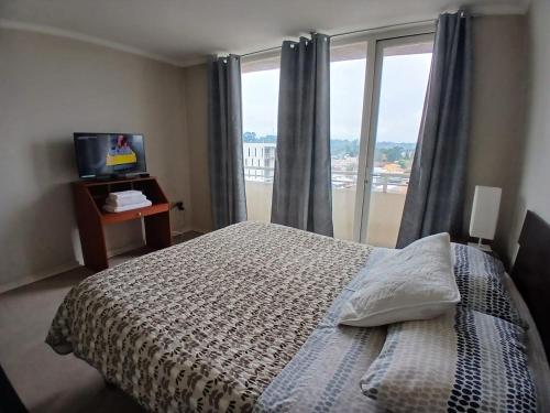 Ένα ή περισσότερα κρεβάτια σε δωμάτιο στο San Ramón 807