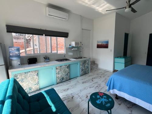 En eller flere senge i et værelse på La Puerta Blanca #7