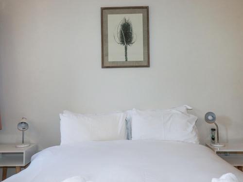 Letto o letti in una camera di Rose's Stable