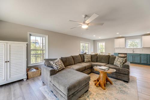 a living room with a couch and a table at Broadkill Beach Gem with Beach Access, Dogs Welcome in Milton