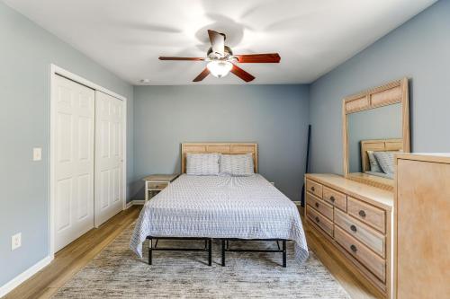 a bedroom with a bed and a ceiling fan at Broadkill Beach Gem with Beach Access, Dogs Welcome in Milton