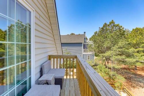 a balcony with stairs and benches on a house at Broadkill Beach Gem with Beach Access, Dogs Welcome in Milton