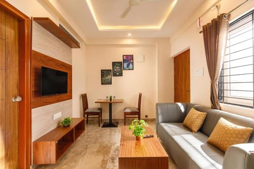 Zona de estar de Move-Inn OBS Serviced Apartments Koramangala