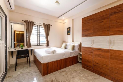 Cama o camas de una habitación en Move-Inn OBS Serviced Apartments Koramangala