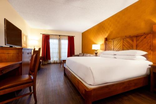 Кровать или кровати в номере Eldorado Hotel and Spa