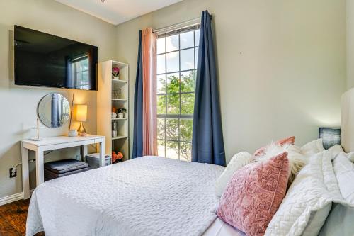 a bedroom with a white bed and a window at Explore and Unwind Charming Bedford Apartment in Bedford