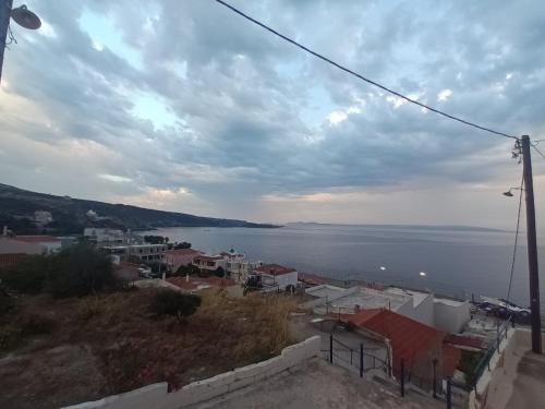a view of a city and a body of water at Vrontas House in Neapolis