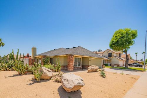 a house with rocks in the front yard at Private Pool & Fully Fenced Yard Near Mntn Park in Glendale