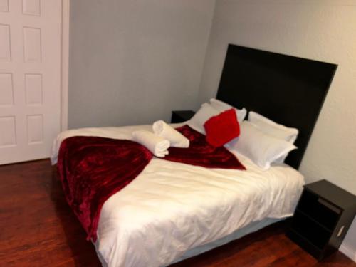 Postel nebo postele na pokoji v ubytování M&D Guest House