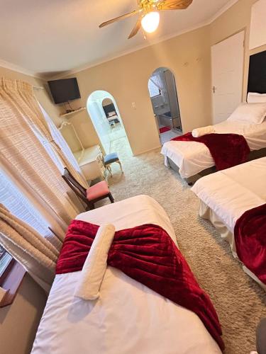 Postel nebo postele na pokoji v ubytování M&D Guest House