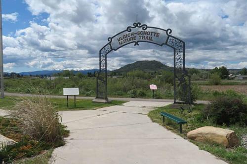 a sign that says welcome to a wildlife trail at Bo's Copper City Charmer, easy Freeway Access, open floorplan in Butte