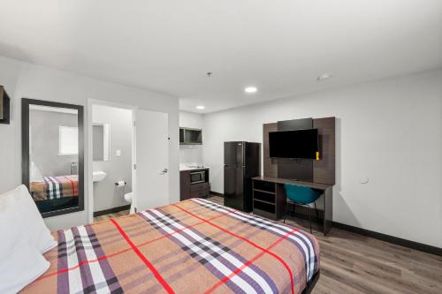Ένα ή περισσότερα κρεβάτια σε δωμάτιο στο Southern Suites Kennesaw