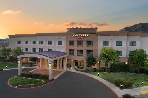 a rendering of a hotel with a building at Courtyard by Marriott Santa Clarita Valencia in Valencia
