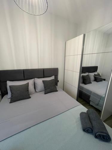 Ένα ή περισσότερα κρεβάτια σε δωμάτιο στο Elysia apartments - Skala Eressos