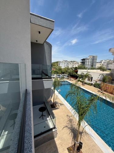 a view of a swimming pool from a building at Afrimi Hotel in Ksamil