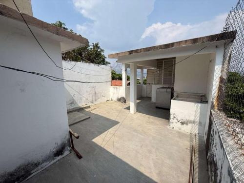 a view of a kitchen in a house at 3 BR house 1AC y garage in Parque de la Marimba in Tuxtla Gutiérrez